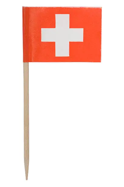 One of those tiny flags on a toothpick. This one is the flag of Switzerland. Isolated on a pure white background.