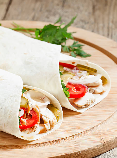 istock Shawarma, turkish doner kebab, roll with meat and pita bread 483190252
