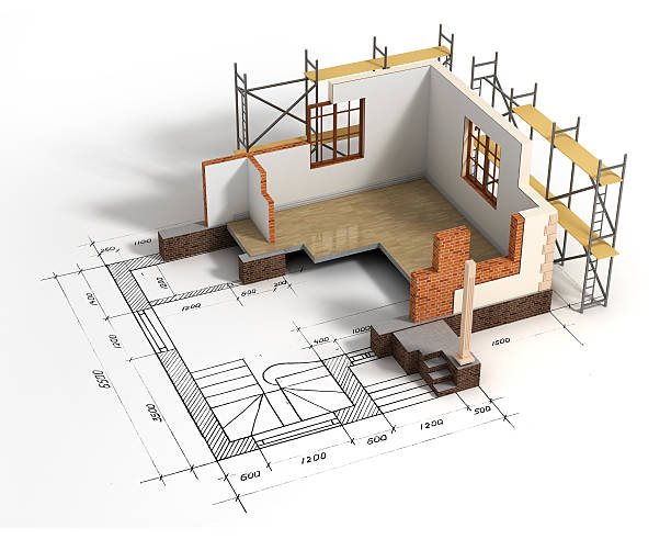 istock House with open interior on top of blueprints. Construction concept. 483194514