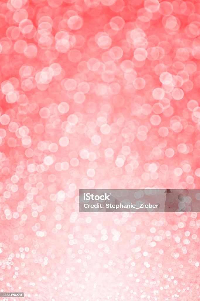 Coral Sparkle Bokeh Background Pink coral glitter sparkle bokeh background invite 2015 Stock Photo