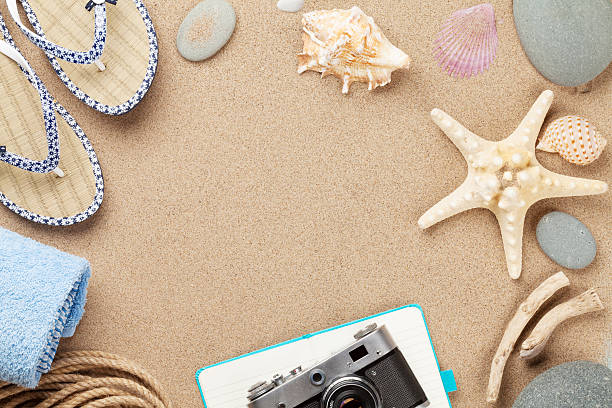 istock Travel and vacation background with items over sand 483198914