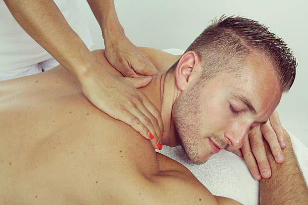 istock massage of an handsome man 483199672