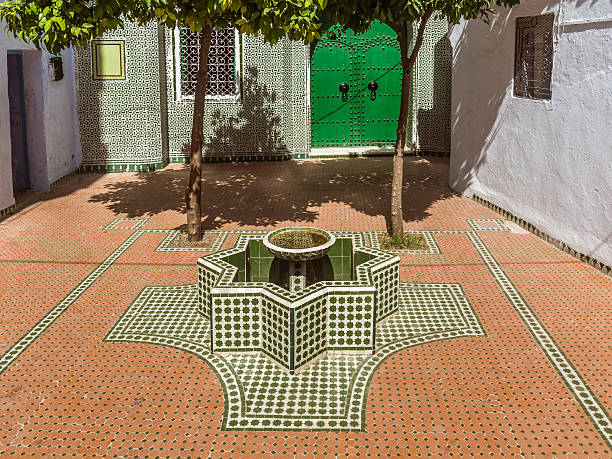 zawiya - fountain courtyard tile wall стоковые фото и изображения
