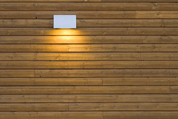 Wall lamp Downlight lamp on wooden wall panel. recessed light stock pictures, royalty-free photos & images