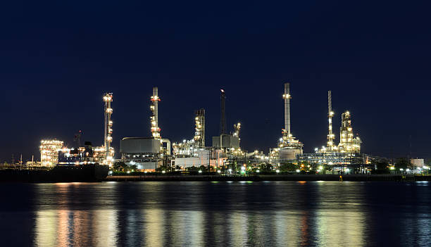 istock Oil refinery plant illuminated at night 483200100
