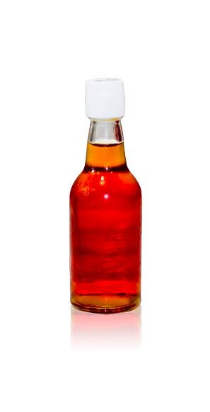 Fish sauce bottle isolated in the white background