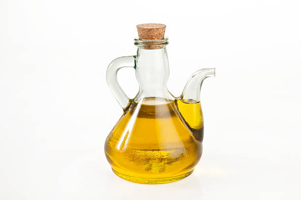 Olive Oil in Glass isolated white background with clipping path