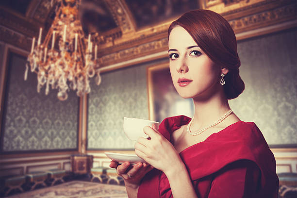 Beautiful redhead women. Photo in retro style.