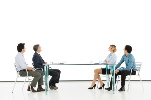 Business Colleague Looking At Projection Screen