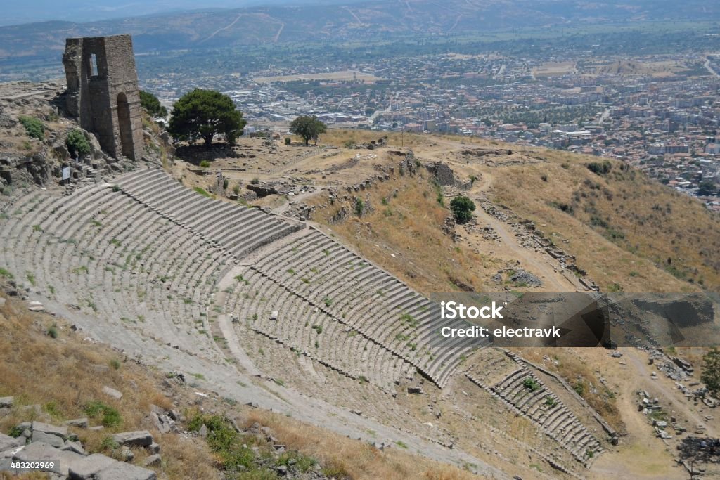 Amphitheatre An ancient amphitheater built on a steep hill. Aegean Sea Stock Photo