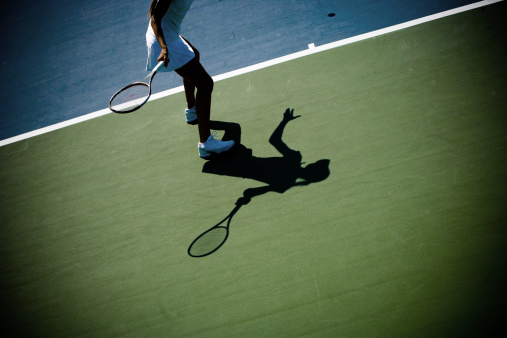 female tennis player setting up for a forehand. Vignette and image manipulation for effect. Please visit my \