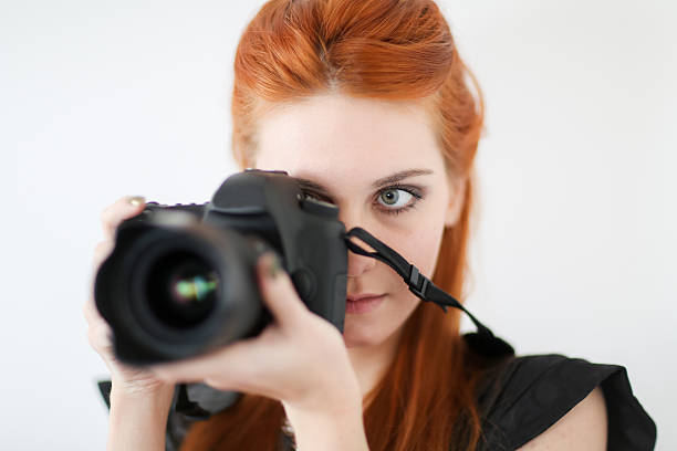 istock Young woman taking a photo 483204085
