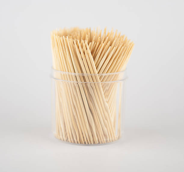 istock wooden tooth picks on white 483204207