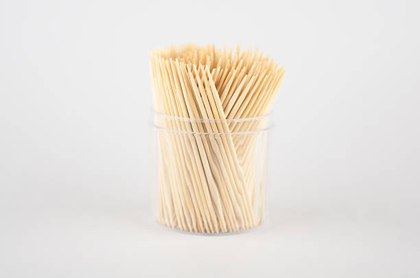 istock wooden tooth picks on white 483204253