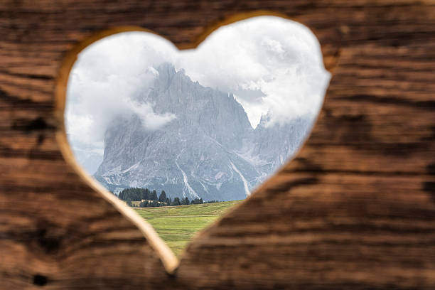 istock Langkofel in background with  wooden heart 483204566