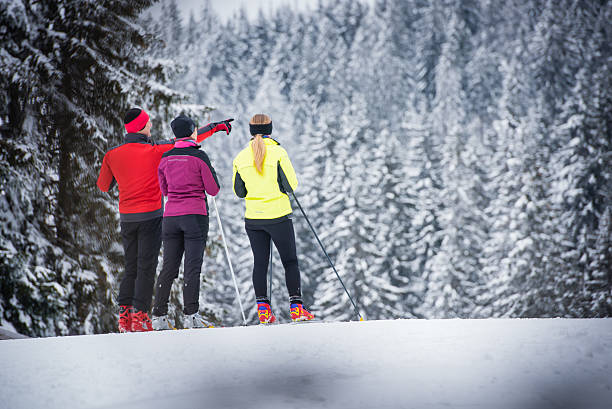 istock Man and women standing and discussing 483204832