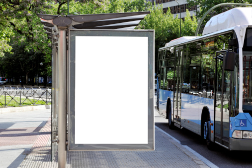 Clean billboard with bus and bus stop.