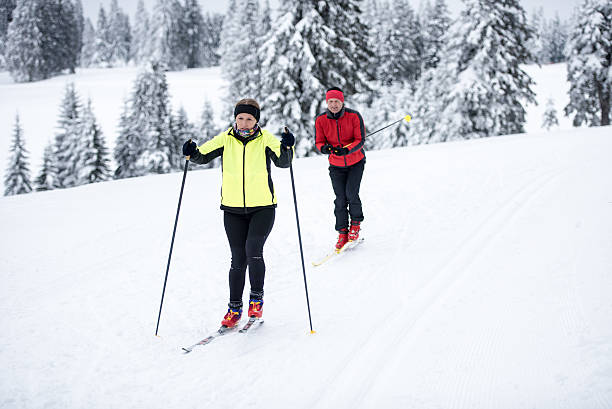 istock Man and woman enjoying skiing 483204954