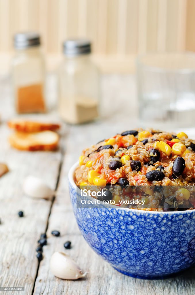 black beans, quinoa and corn chili black beans, quinoa and corn chili on a white wood background. the toning. selective focus 2015 Stock Photo