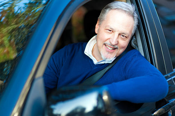 istock Mature man driving his car 483205881