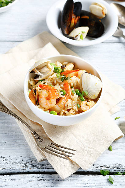 istock Delicious rice with shrimp and herbs 483210130