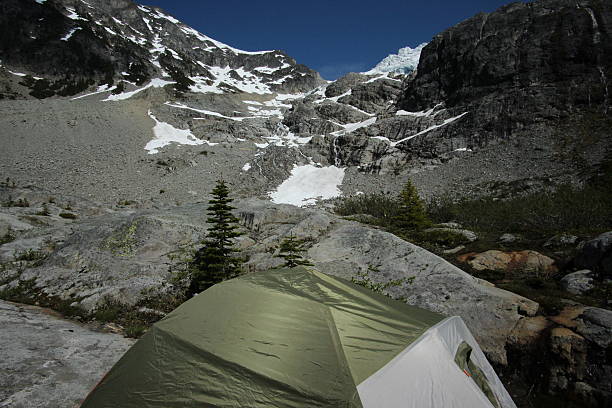 istock Tent in front of a snowy mountain 483211350