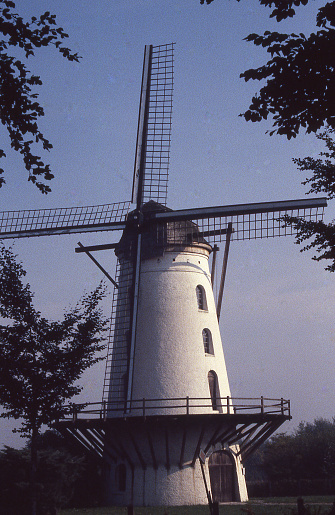 Antique windmill near Bruges Flanders Belgium