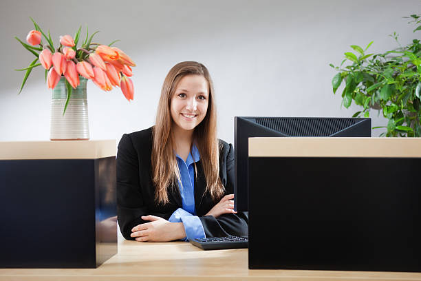 istock Bank Counter Window with Friendly & Smiling Teller 483226072