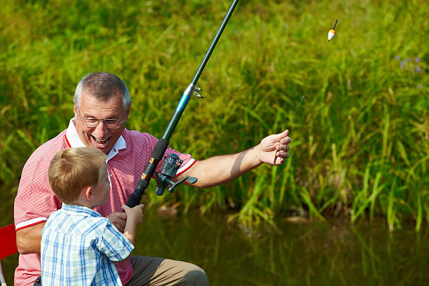 sieć - fishing rod fishing fishing reel casting zdjęcia i obrazy z banku zdjęć