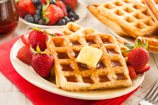 Homemade Belgian Waffles with Strawberries and Maple Syrup