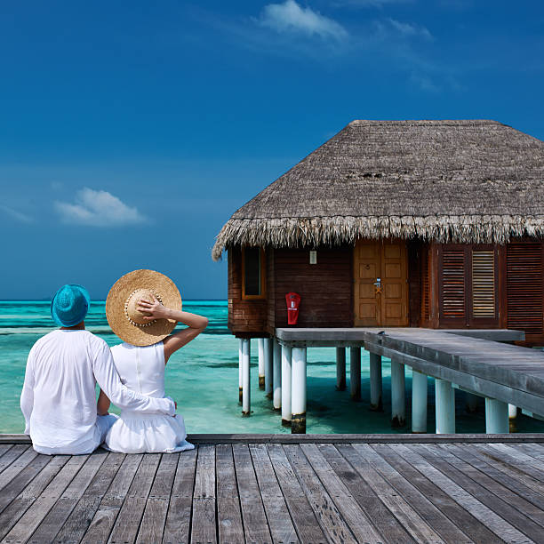 Paradise Beach with coconut palm trees and white coral sand