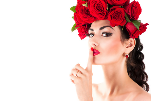 beautiful fashion model with red roses hairstyle