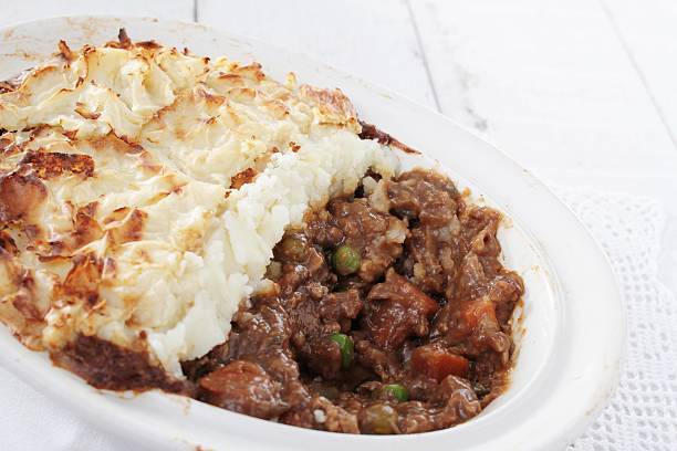 istock traditional cottage pie in dish 483232340