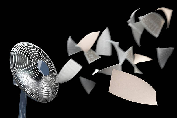 fan and winding paper concept background on isolate black stock photo