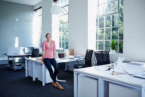 Portrait of a businesswoman in a trendy office