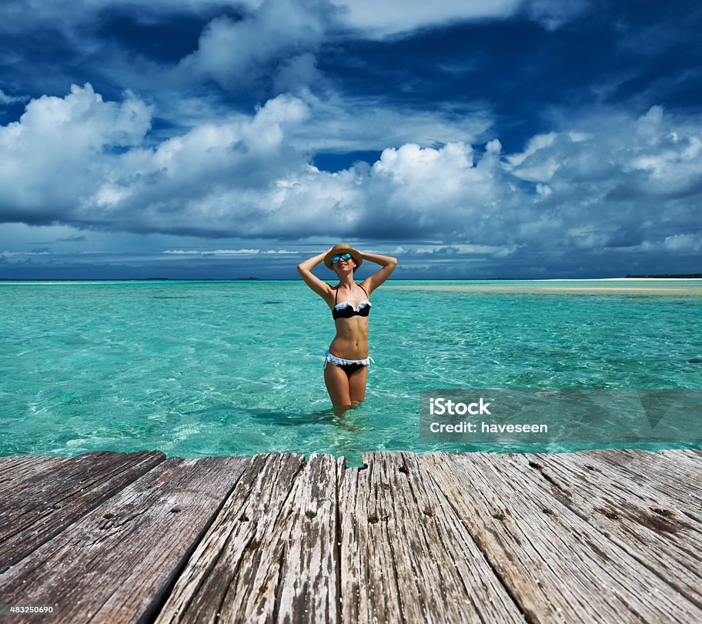 Woman at beach Woman in bikini at tropical beach 2015 Stock Photo