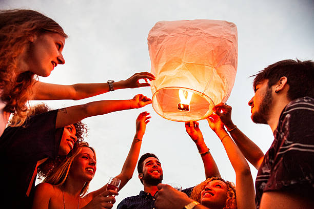 istock Lighting a chinese lantern at birthday party 483250976