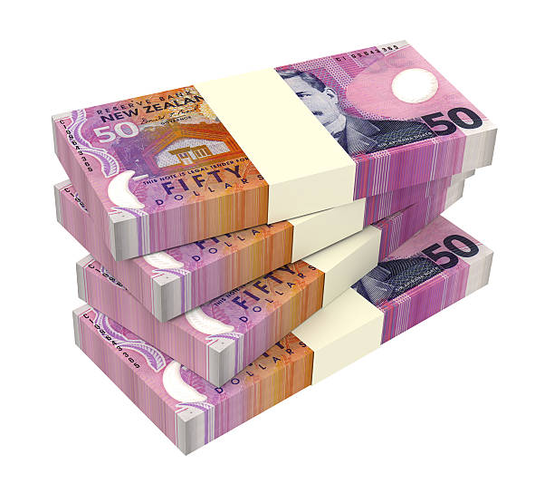 istock New Zealand currency isolated on white background. 483255698