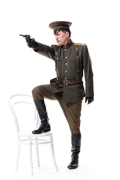 istock Russian officer with gun 483255770