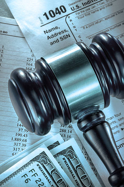 istock Budget, tax form, gavel and dollars 483257230