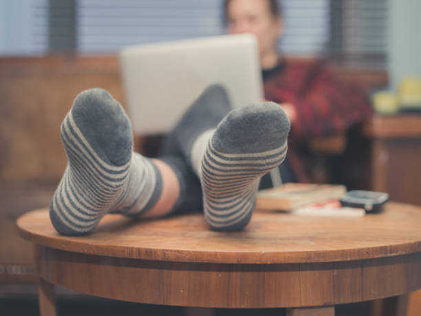 istock Woman using her laptop at home 483257292