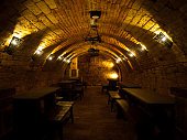 Dark wine cellar with tables