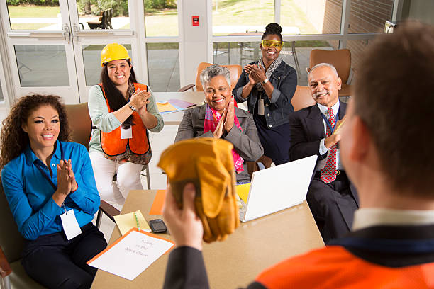 istock Safety in the workplace. Presentation with office workers. 483259553