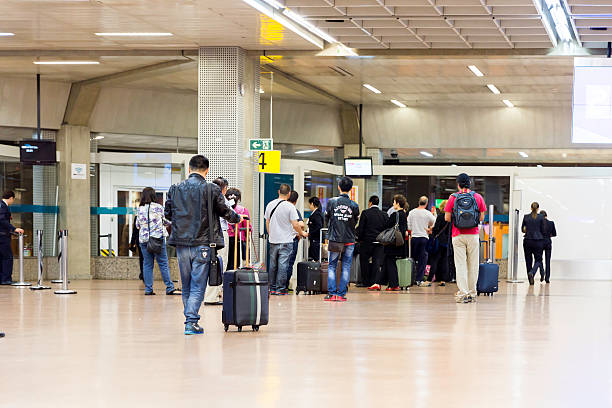 International Gru Airport located in Sao Paulo, Brazil Sao Paulo, Brazil - May 5, 2014: People walking at the International Gru Airport located in Sao Paulo, Brazil guarulhos photos stock pictures, royalty-free photos & images