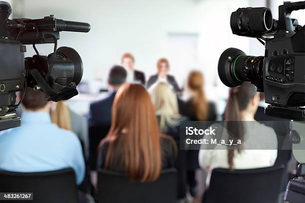 Press Conference Stock Photo - Download Image Now - Adult, Asking, Blond Hair