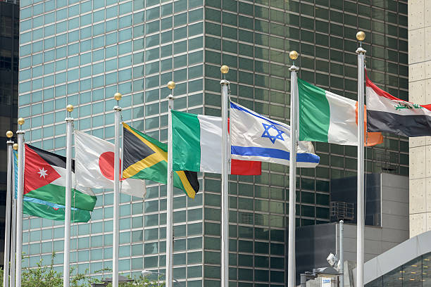 istock flags outside united nations building in new york 483263048