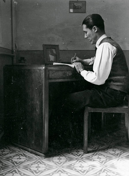 istock Man Writing at Desk in 1940,Black And White 483263227