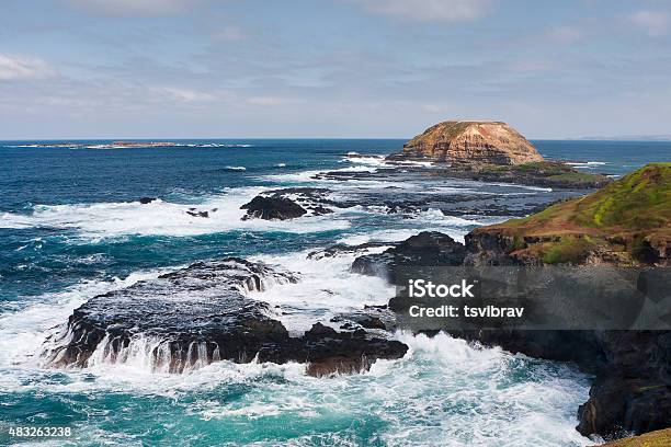 Round Island With Crusing Waves Nobbies Phillip Island Austra Stock Photo - Download Image Now