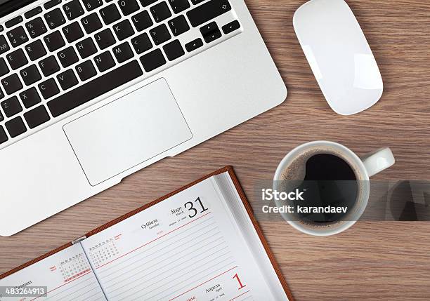 Notepad Laptop And Coffee Cup On Wood Table Stock Photo - Download Image Now - Above, Blank, Business