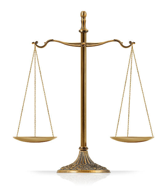 Scales of Justice "Scales of Justice" in balance and isolated on white background. equal arm balance photos stock pictures, royalty-free photos & images